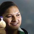 New Zealand's Valerie Adams  poses with her gold medal. (AP Photo/Anja Niedringhaus)