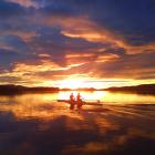 New Zealand Universities rowers Dougal MacDuff (left) and Matthew McGovern train on  Otago...