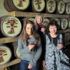 New Zealand  Whisky Company Oamaru maturation store staff members, (from left) Fiona Stewart, Kay...