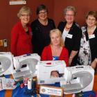 nner Wheel Club members Margaret Bullmen (left), Jean MacNicol (second from right) and Nova...