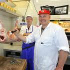 North Dunedin butcher Neville Eskrick (rear), who has spent 50 years in the butchery trade, with...