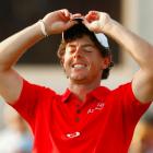 Northern Irish golfer Rory McIlroy reacts on the 18th green after winning the PGA Championship at...