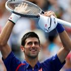 Novak Djokovic of Serbia celebrates after defeating Julien Benneteau of France at the US Open in...