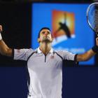 Novak Djokovic of Serbia celebrates defeating Tomas Berdych of Czech Republic in their men's...