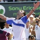 Novak Djokovic, of Serbia, celebrates his win against Rafael Nadal, of Spain, in the men's final...