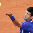 Novak Djokovic of Serbia serves to Guido Pella of Argentina during their men's singles match at...