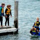 Novice sailors at the Break-Away Summer Sailing programme (from left) Georgia Pope (12), Hanna...