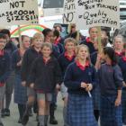 Oamaru Intermediate School pupils march to show they care about  teaching staff cuts. Photo by...