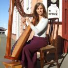 Oamaru musician Lynley Caldwell enjoys playing her harp. Photo by Sally Rae.