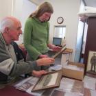 Oamaru writer Graeme Leather (left) and North Otago Museum curator Chloe Searle pore over the...