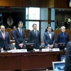 Observing a minute of silence during a European Union extraordinary summit seeking for a solution...