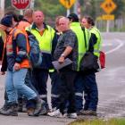 Oceana Gold staff leave a meeting at East Otago High School in Palmerston  yesterday after...