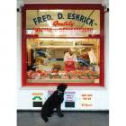 Gemma looks longingly at North East Valley butcher Neville Eskrick's mouth watering window display.