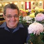 Wayne Shaw with one of his chrysanthemums at the North Otago Horticultural Society's show at the...