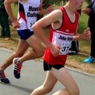 Oli Chignell leads Andrew Catley, of Howick College, in the senior boys 6km road race in Timaru...