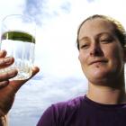 Olive McRae holds a glass of non-fluoridated water. Photo by Gerard O'Brien.