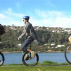 On One Unicyclists Dunedin club members Paul Cardno, Scott Kerr and Daniel Goodman ride their...