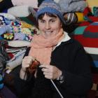 Operation Cover Up Dunedin co-ordinator Shona Bovey adds to donations for this year's campaign....