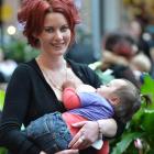 Organiser Demelza Fraser-O'Donnell feeds Isabella Fraser-O'Donnell (18 months) during an annual...