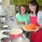 Orwell Street Chapel members Janine Hayes (left) and Steph Bignell prepare soup to help flood...