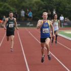 Otago’s Andrew Whyte powers down the home straight on his way to winning the senior men’s 400m...