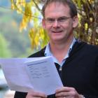 Otago Adventure Development counsellor Scott Blair holds a leaflet on the health effects of...