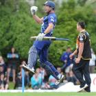 Otago all-rounder Ian Butler leaps into the air after hitting the winning runs.