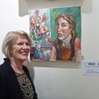 Otago Art Society 2014 exhibition winner Judy Smith, with her acrylic painting Emma. Photo supplied.