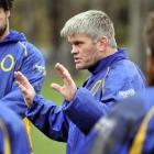 Otago assistant coach David Latta at training at Logan Park yesterday, with Otago loose forward...