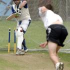 Otago batsman Leighton Morgan defends a delivery from James Fuller during a training session at...