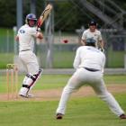 Otago batsman Warren McSkimming watches the ball travel into the waiting hands of Auckland's...