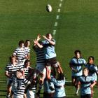 Otago Boys' High School (left) and King's High School forwards compete for lineout possession...