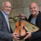 Otago Boys' High School rector Clive Rennie (left) and TV producer Matthew Thomason hold the...