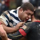 Otago Boys' High School's 135kg prop Sione Asi prevails against the a St Bede's  defender in the...