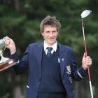 Otago Boys High School year 13 pupil Duncan Croudis celebrates his victory in the Cobham Cup....