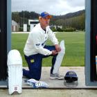Otago captain Craig Cumming pads up before a training session at the University Oval yesterday....