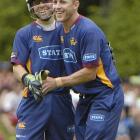 Otago captain Craig Cumming (right) celebrates with wicketkeeper Derek de Boorder after the pair...