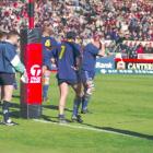 Otago captain David Latta (right) holds his head as Andrew Mehrtens kicks the winning penalty in...