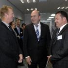 Otago Chamber of Commerce president Peter McIntyre (left) shares a chuckle with Economic...