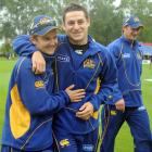 Otago coach Mike Hesson (left) and all-rounder Nathan McCullum celebrate after the State twenty...