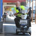 Otago Daily Times reporter Shawn McAvinue gives a mobility scooter a whirl in South Dunedin...