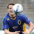 Otago first five-eighth Glenn Dickson training at Carisbrook yesterday. Photo by Peter McIntosh.