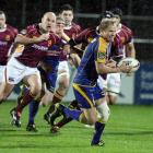 Otago first five-eighth Tony Brown makes a break against the Southland Stags in the ITM Cup pre...