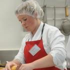 Otago Girls' High School pupil Abbie Larson  prepares a Thai beef burger in  the Otago regional...