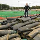 Otago Hockey chief executive Chris Aubin stands on top of the remnants of the old sand-based turf...
