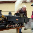 Otago Model Engineering Society life member Des Burrow (84) prepares his model steam engine for a...