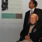 Otago Museum chief executive Shimrath Paul (rear) and Richard Skinner reflect on an information...