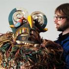 Otago Museum humanities registrar Scott Reeves displays an Igala boy's initiation mask from...