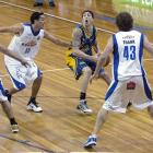 Otago Nuggets American import Tyler Amaya looks for a way past the Wellington Saints' Troy McLean...