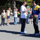 Otago Nuggets players Antoine Tisby (right) and Tyler Amaya show year 4-6 pupils at Kaikorai...